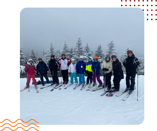 Troop 1175 scouts celebrating together on a snowy trail.